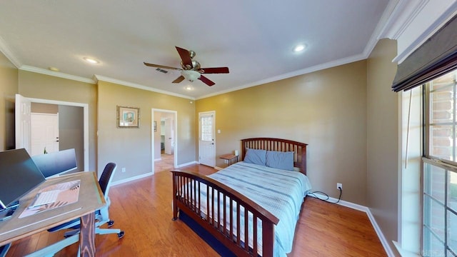3805 Irby Dr, Conway, AR 72034 - bedroom with multiple windows, wood finished floors, baseboards, recessed lighting, and crown molding