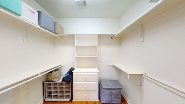 3805 Irby Dr, Conway, AR 72034 - walk in closet featuring wood finished floors