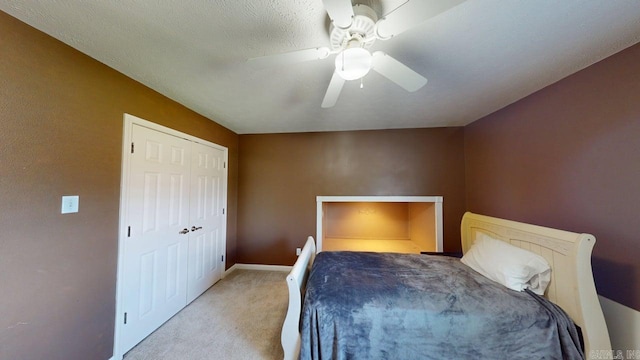 3805 Irby Dr, Conway, AR 72034 - carpeted bedroom with a ceiling fan, a closet, and baseboards