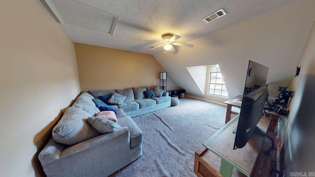 3805 Irby Dr, Conway, AR 72034 - carpeted living room with lofted ceiling, a ceiling fan, a textured ceiling, and attic access