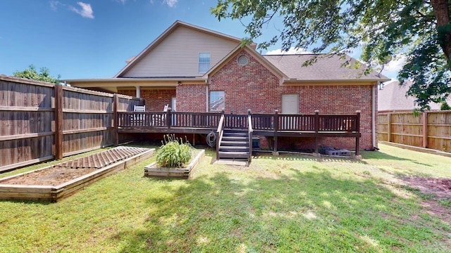 3805 Irby Dr, Conway, AR 72034 - back of house with a garden, brick siding, and a wooden deck