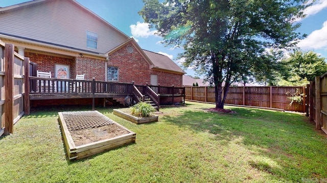 3805 Irby Dr, Conway, AR 72034 - view of yard with a wooden deck and a garden