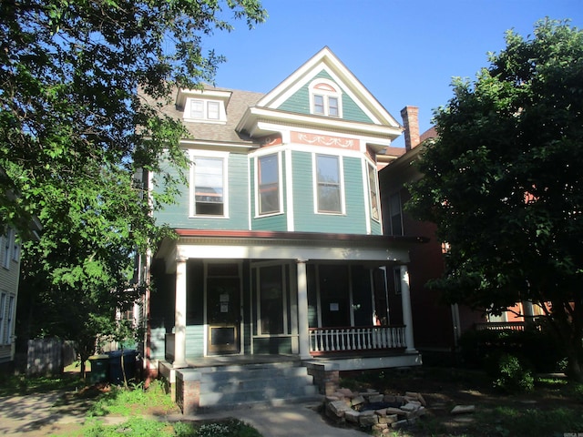 2111 S Arch St, Little Rock, AR 72206 - victorian home with a porch and roof with shingles