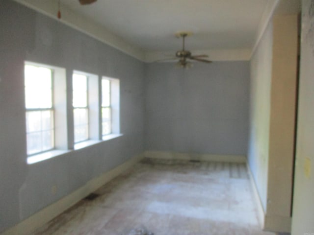 2111 S Arch St, Little Rock, AR 72206 - empty room featuring a ceiling fan and baseboards