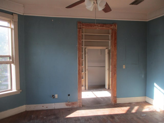 2111 S Arch St, Little Rock, AR 72206 - spare room featuring ceiling fan and baseboards