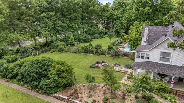 view of yard with an outdoor fire pit