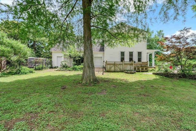 view of yard featuring an attached garage