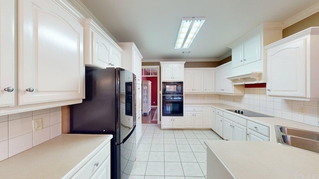 4335 Gazebo Dr, Conway, AR 72034 - kitchen featuring black appliances, decorative backsplash, white cabinets, and crown molding