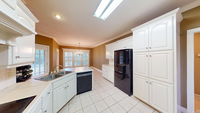 4335 Gazebo Dr, Conway, AR 72034 - kitchen with black appliances, a sink, ornamental molding, a chandelier, and white cabinets
