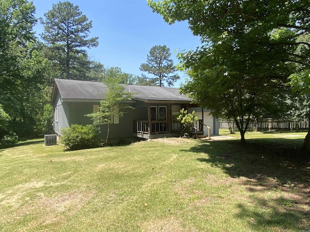 47 Eagle Ln, Mount Ida, AR 71957 - back of house with covered porch and central AC unit