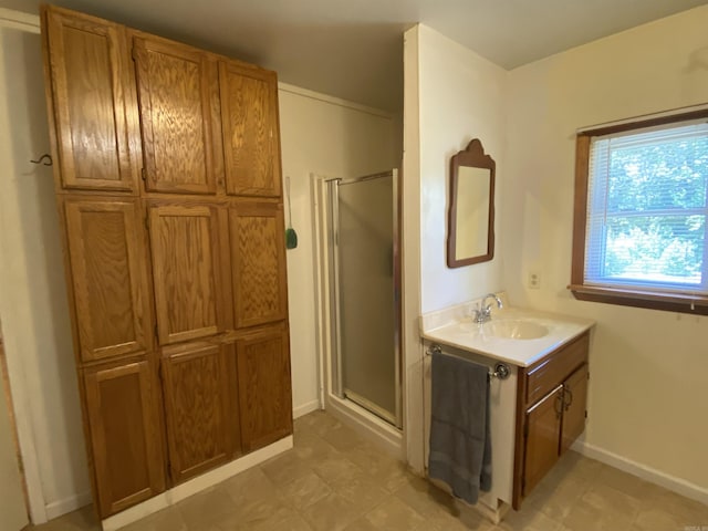 47 Eagle Ln, Mount Ida, AR 71957 - bathroom with a stall shower, vanity, and baseboards