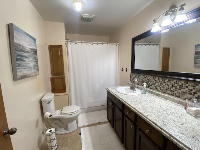 47 Eagle Ln, Mount Ida, AR 71957 - bathroom with toilet, tasteful backsplash, vanity, tile patterned floors, and shower / bathtub combination with curtain