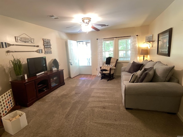 47 Eagle Ln, Mount Ida, AR 71957 - living area featuring a ceiling fan, carpet flooring, and baseboards