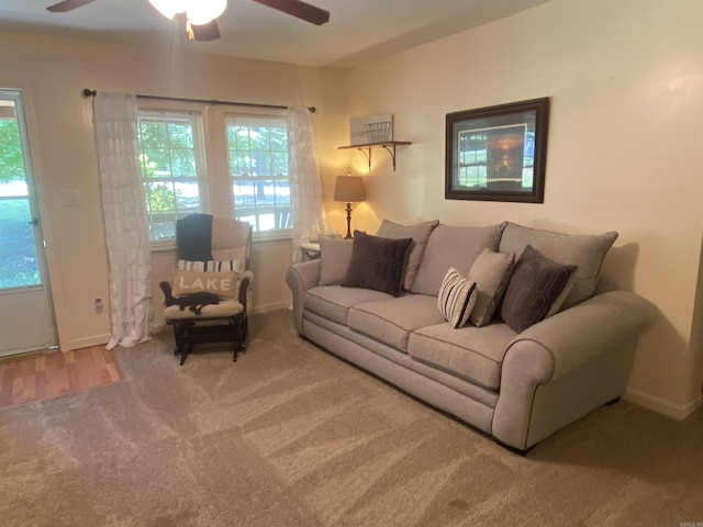 47 Eagle Ln, Mount Ida, AR 71957 - carpeted living room featuring a ceiling fan, plenty of natural light, and baseboards