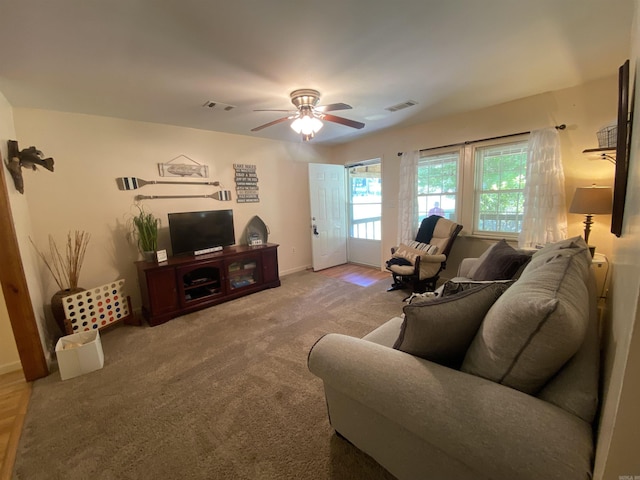 47 Eagle Ln, Mount Ida, AR 71957 - carpeted living area featuring ceiling fan and baseboards