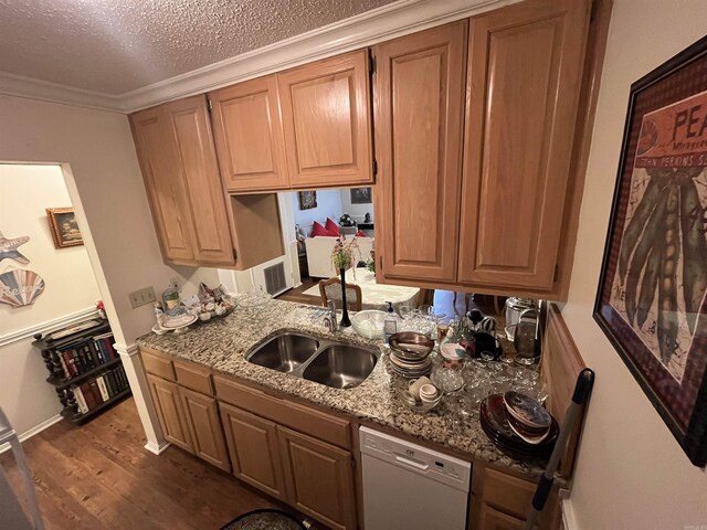 135 Hillview Dr Unit 115, Fairfield Bay, AR 72088 - kitchen featuring white dishwasher, dark wood-style floors, light stone countertops, ornamental molding, and a sink