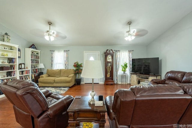 1244 N Scenic Dr, Heber Springs, AR 72543 - living area with ceiling fan, vaulted ceiling, healthy amount of natural light, and wood finished floors