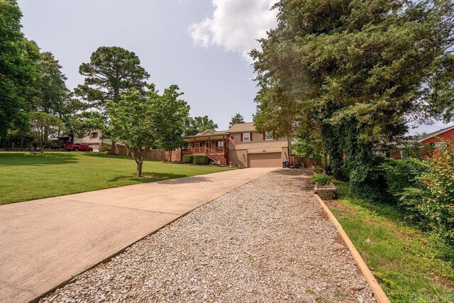 1244 N Scenic Dr, Heber Springs, AR 72543 - view of front of home featuring a garage and concrete driveway