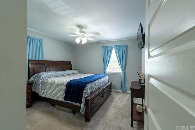 1244 N Scenic Dr, Heber Springs, AR 72543 - bedroom featuring light carpet, a ceiling fan, and baseboards