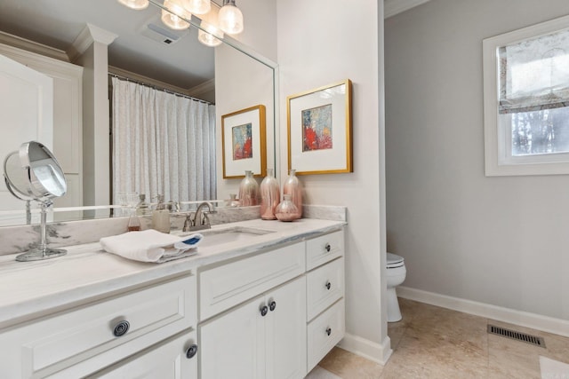 13200 Bart Moreland Dr, Roland, AR 72135 - full bath with ornamental molding, vanity, toilet, baseboards, and tile patterned floors