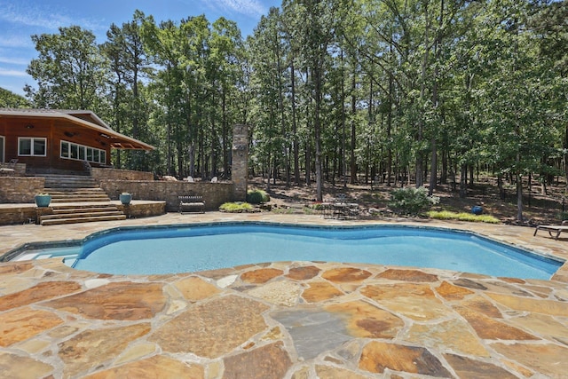 13200 Bart Moreland Dr, Roland, AR 72135 - swimming pool with stairway and a patio