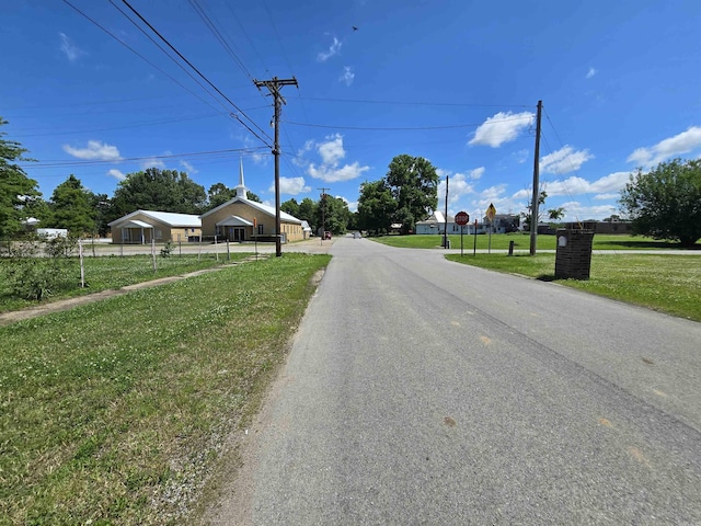 302 SW Broad St, Hoxie, AR 72433 - view of asphalt street featuring traffic signs