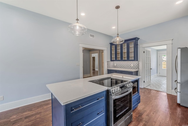 1908 S Gaines St, Little Rock, AR 72206 - kitchen featuring appliances with stainless steel finishes, blue cabinets, french doors, dark wood-style floors, and recessed lighting