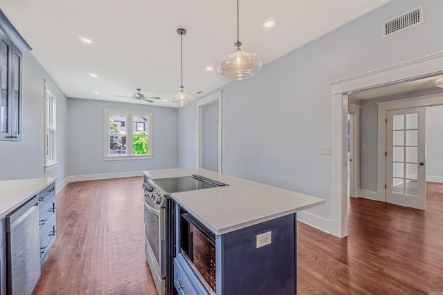 1908 S Gaines St, Little Rock, AR 72206 - kitchen with stainless steel appliances, dark wood-type flooring, baseboards, and recessed lighting
