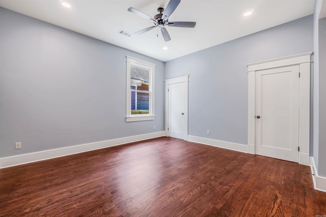 1908 S Gaines St, Little Rock, AR 72206 - unfurnished bedroom featuring two closets, dark wood-style flooring, baseboards, recessed lighting, and a ceiling fan