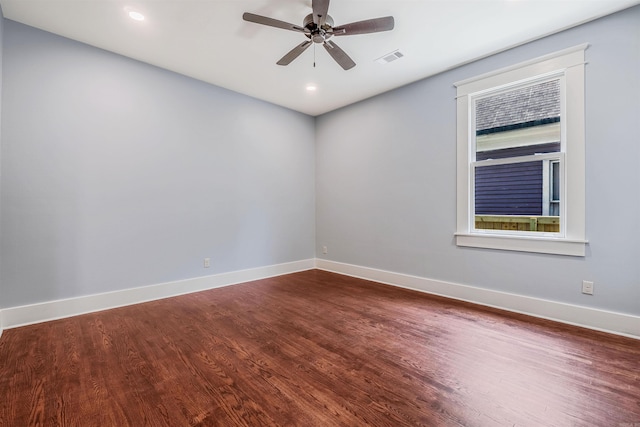 1908 S Gaines St, Little Rock, AR 72206 - empty room featuring dark wood-type flooring, baseboards, ceiling fan, and recessed lighting