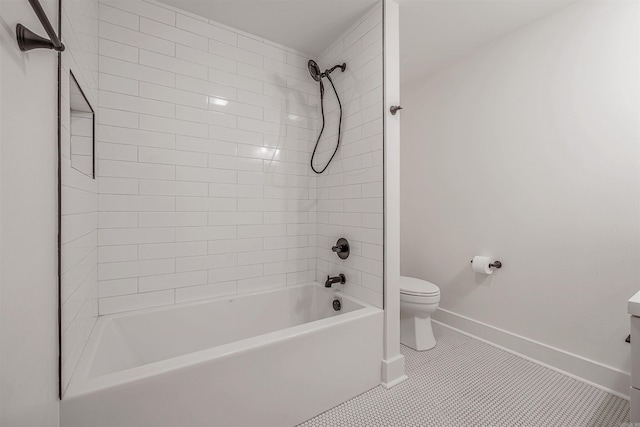 1908 S Gaines St, Little Rock, AR 72206 - full bathroom with toilet, shower / washtub combination, tile patterned flooring, and baseboards