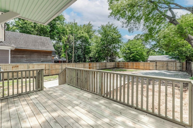 1908 S Gaines St, Little Rock, AR 72206 - wooden deck featuring a fenced backyard and view of scattered trees