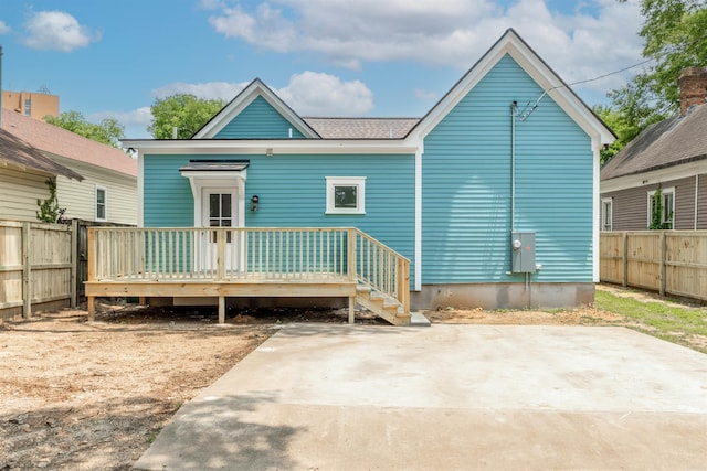 1908 S Gaines St, Little Rock, AR 72206 - rear view of property featuring a wooden deck and a patio