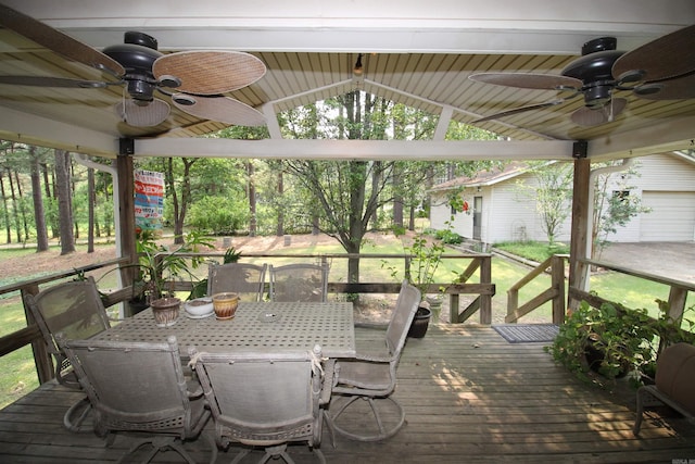 2102 N 22nd St, Paragould, AR 72450 - wooden deck featuring a ceiling fan and outdoor dining space