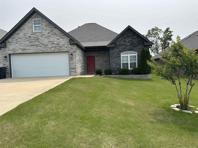 1008 Wildcat Ln, Jonesboro, AR 72405 - view of front of property with concrete driveway, a front yard, roof with shingles, and a garage