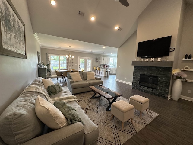 1008 Wildcat Ln, Jonesboro, AR 72405 - living room featuring baseboards, a chandelier, recessed lighting, wood finished floors, and a stone fireplace