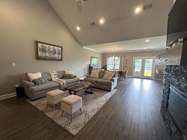 1008 Wildcat Ln, Jonesboro, AR 72405 - living area featuring baseboards, dark wood-style flooring, a chandelier, recessed lighting, and high vaulted ceiling