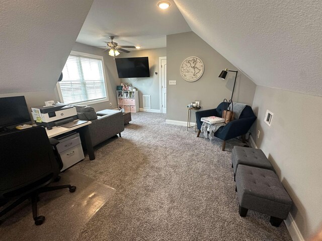 1008 Wildcat Ln, Jonesboro, AR 72405 - carpeted office space featuring a textured ceiling, vaulted ceiling, ceiling fan, and baseboards