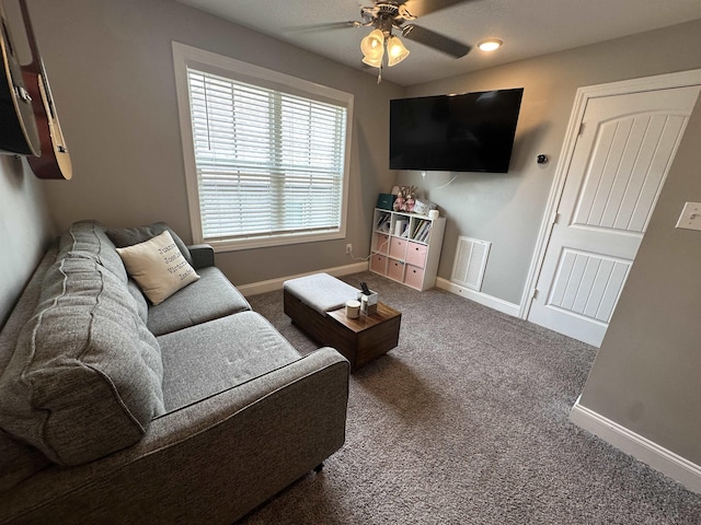 1008 Wildcat Ln, Jonesboro, AR 72405 - carpeted living room featuring ceiling fan and baseboards
