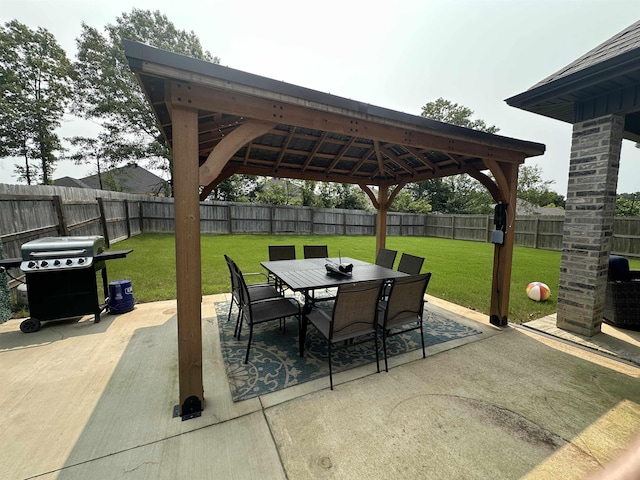 1008 Wildcat Ln, Jonesboro, AR 72405 - view of patio featuring a gazebo, a grill, and outdoor dining space