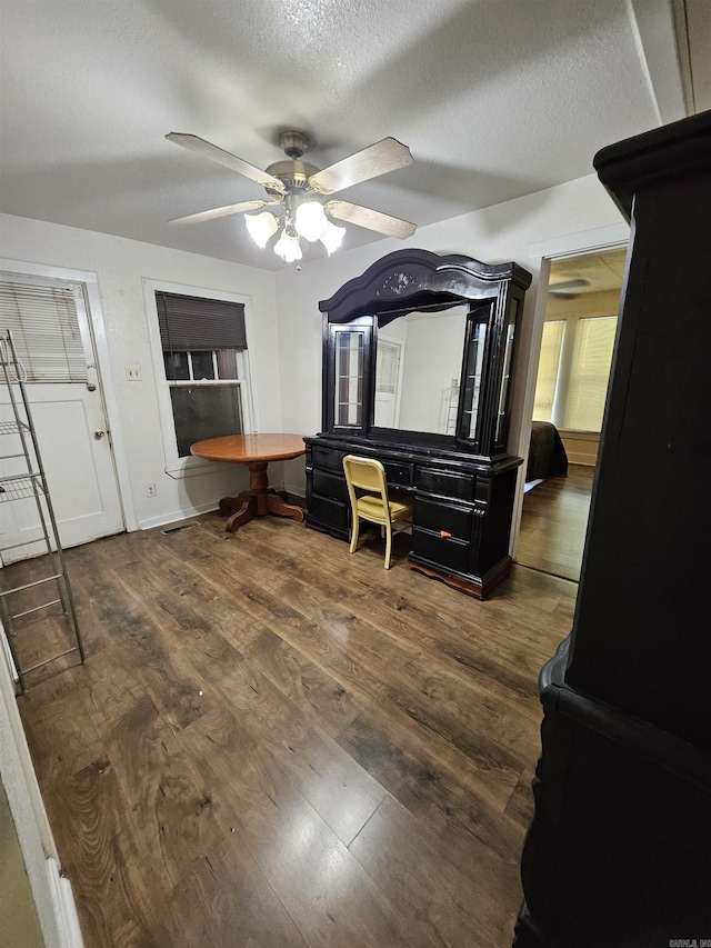 1421 W 25th St, North Little Rock, AR 72114 - office area featuring ceiling fan, wood finished floors, and a textured ceiling