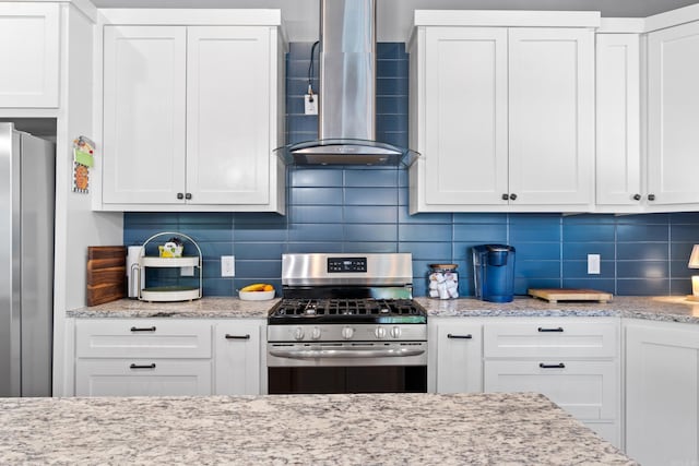 3069 Spring Mill Dr, Mountain Home, AR 72653 - kitchen featuring stainless steel appliances, island exhaust hood, and white cabinets