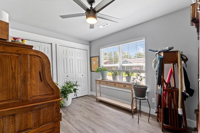 3069 Spring Mill Dr, Mountain Home, AR 72653 - sitting room featuring a ceiling fan, light wood-style flooring, and baseboards