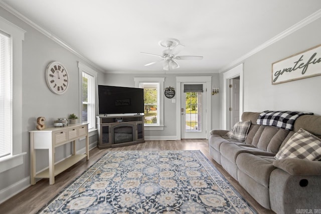 1032 Virginia Ave, Bauxite, AR 72011 - living area with wood finished floors, ornamental molding, baseboards, and ceiling fan