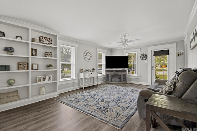 1032 Virginia Ave, Bauxite, AR 72011 - living room featuring crown molding, a ceiling fan, wood finished floors, and baseboards
