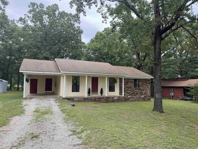 113 Boyd Rd, Southside, AR 72501 - ranch-style house with driveway, a porch, a carport, and a front yard