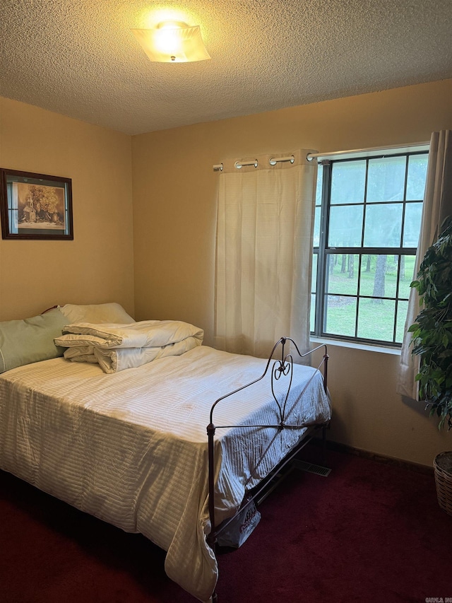 113 Boyd Rd, Southside, AR 72501 - carpeted bedroom with a textured ceiling