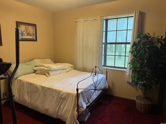 113 Boyd Rd, Southside, AR 72501 - bedroom featuring carpet floors and a textured ceiling