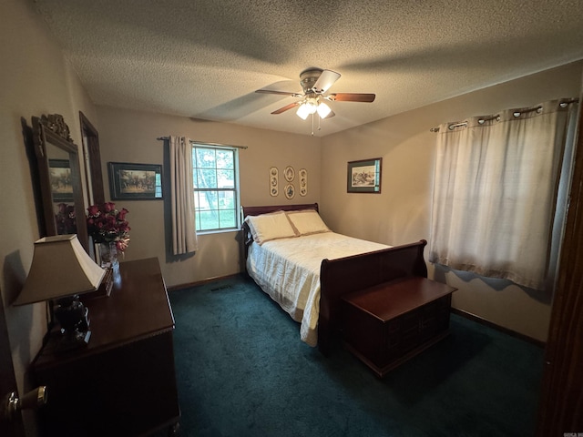 113 Boyd Rd, Southside, AR 72501 - bedroom with dark carpet, a textured ceiling, a ceiling fan, and baseboards