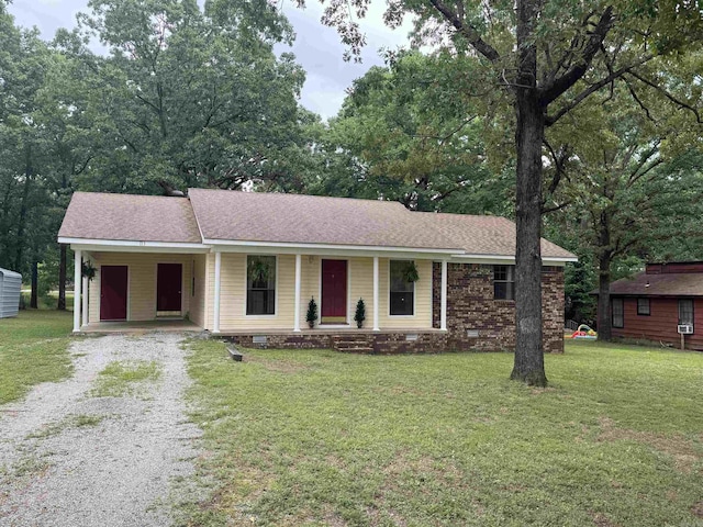 113 Boyd Rd, Southside, AR 72501 - ranch-style house featuring driveway, covered porch, a carport, a front yard, and a shingled roof